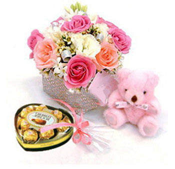 12 Pink Roses in a Vase with  Teddy and heart shaped chocolates